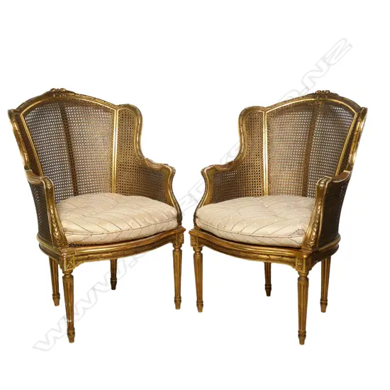 A pair of 19thC French bergère chairs,