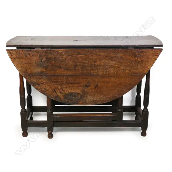 A Georgian oak gateleg table,
