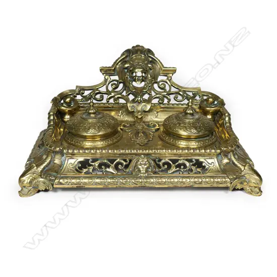 A Victorian brass double inkstand,