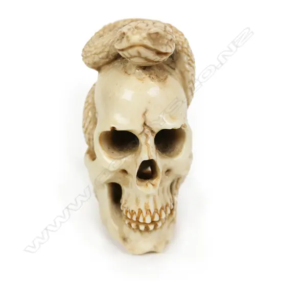 A vintage carved antler Memento Mori,