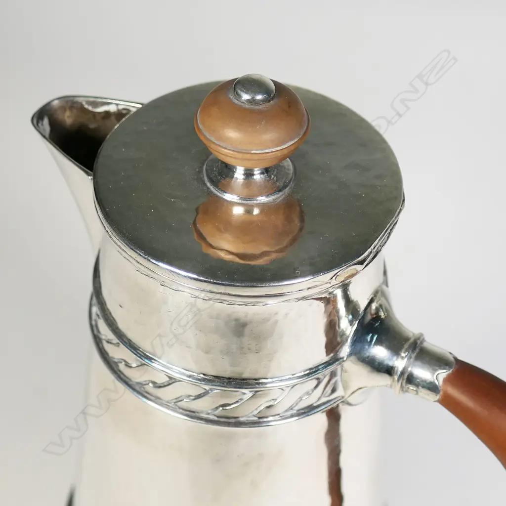 A fine pair of Liberty and Co silver cafe au lait pots, Image 1++