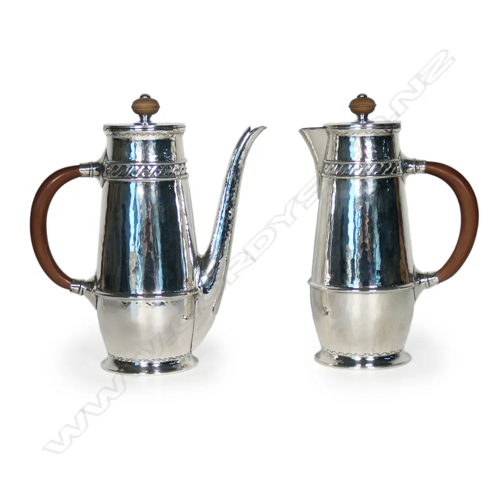 A fine pair of Liberty and Co silver cafe au lait pots, Image 1++
