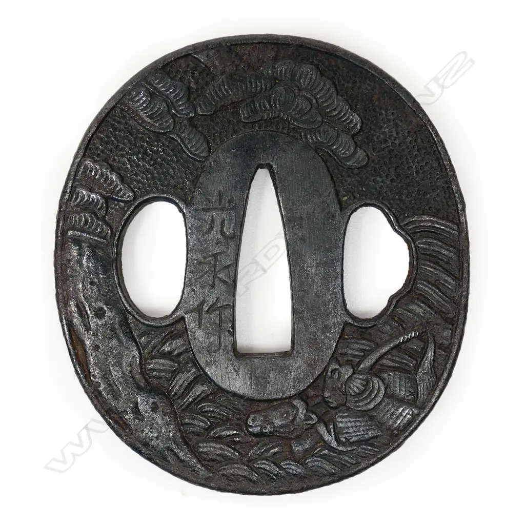 An 18thC late Edo period iron tsuba, Image 1++