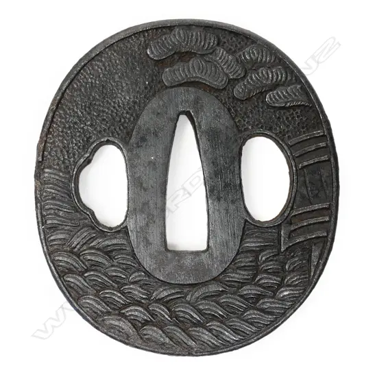 An 18thC late Edo period iron tsuba,