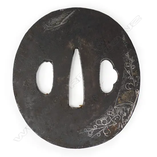 A 17thC Edo period iron tsuba,