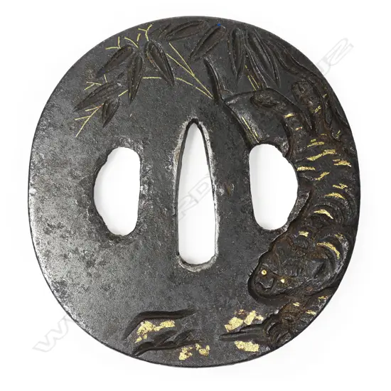 A 17thC Edo period iron tsuba,
