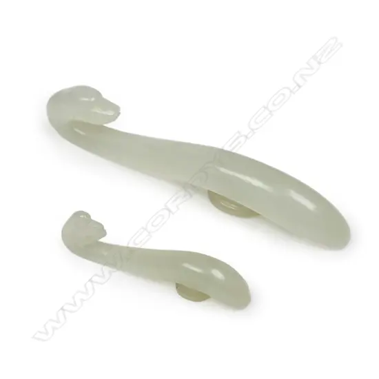 Two old Chinese pale green jade belt hooks,