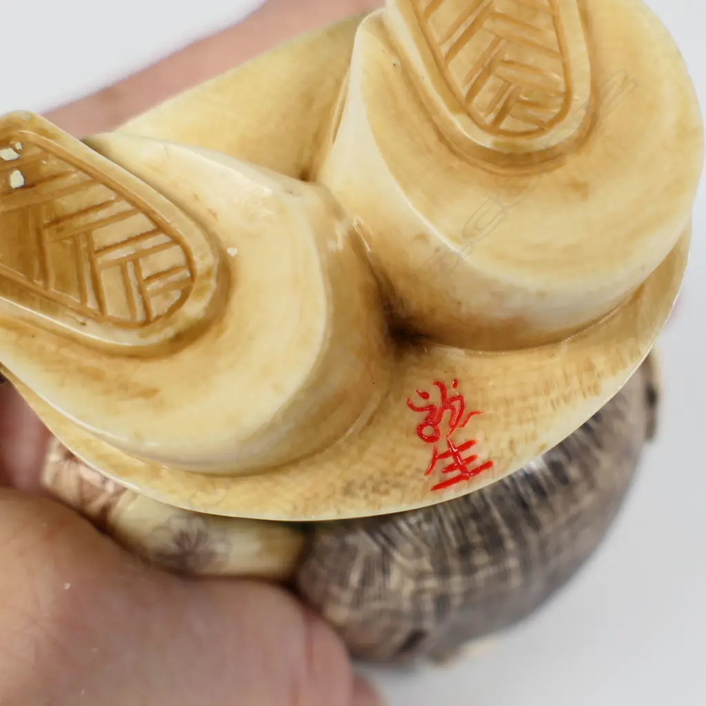 A mid 20thC oriental solid carved ivory okimono figure of Daikokuten (The God of Plenty), Image 1++