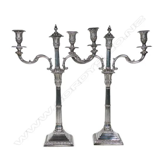 A pair of Victorian style silver plate candelabra,