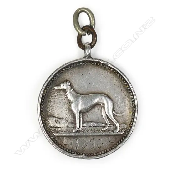 An 1890 ' Auckland Poultry Pigeon Cage Bird & Dog Society' silver medallion,
