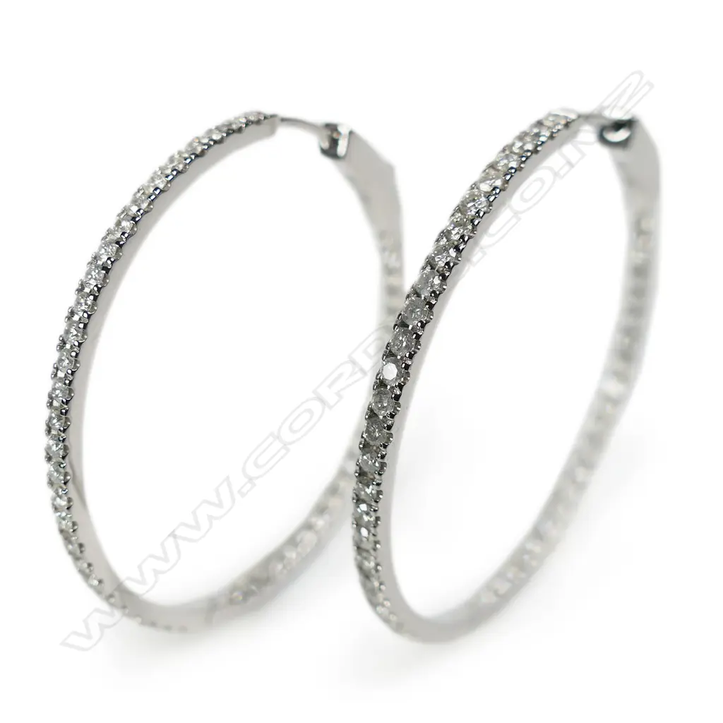 A pair of 14ct white gold and diamond hoop earrings, Image 1++