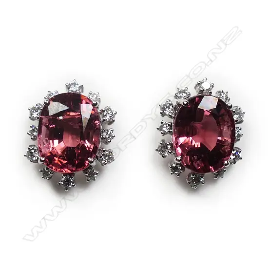 A pair of elegant 18ct white gold diamond and tourmaline earrings,