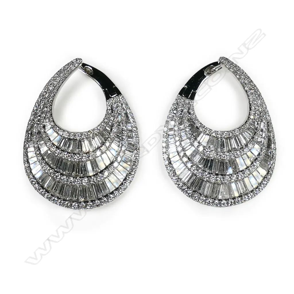 A stylish pair of 18ct white gold and multi diamond wide tapered crescent earrings, Image 1++