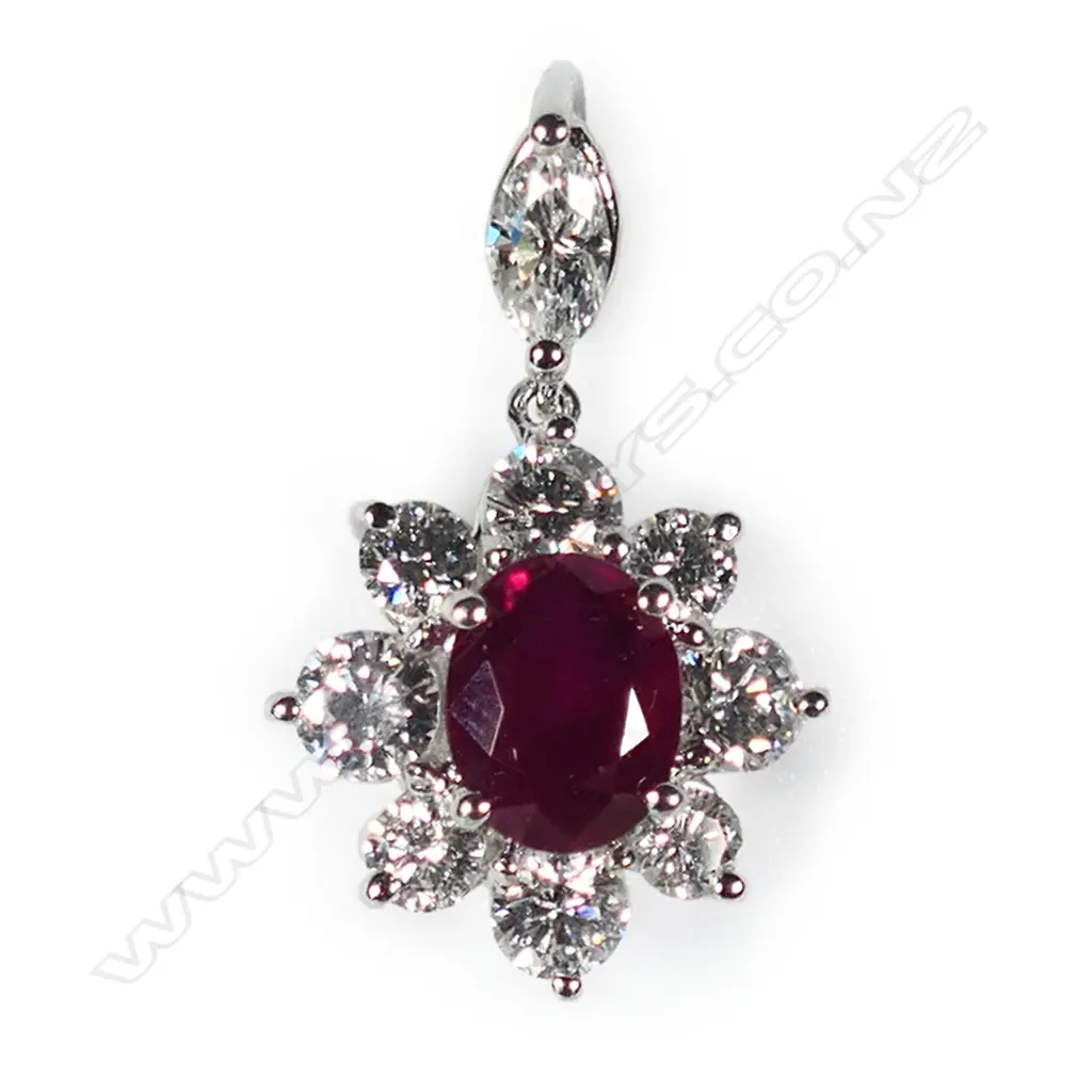 An 18ct white gold ruby and diamond pendant, Image 1++