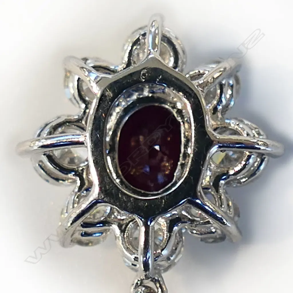 An 18ct white gold ruby and diamond pendant, Image 1++