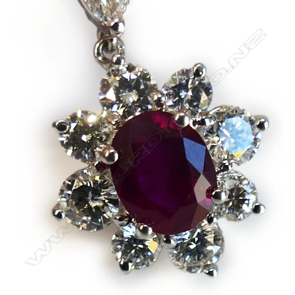 An 18ct white gold ruby and diamond pendant, Image 1++