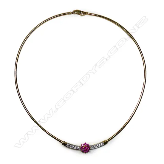 An 18ct gold ruby and sapphire necklet,