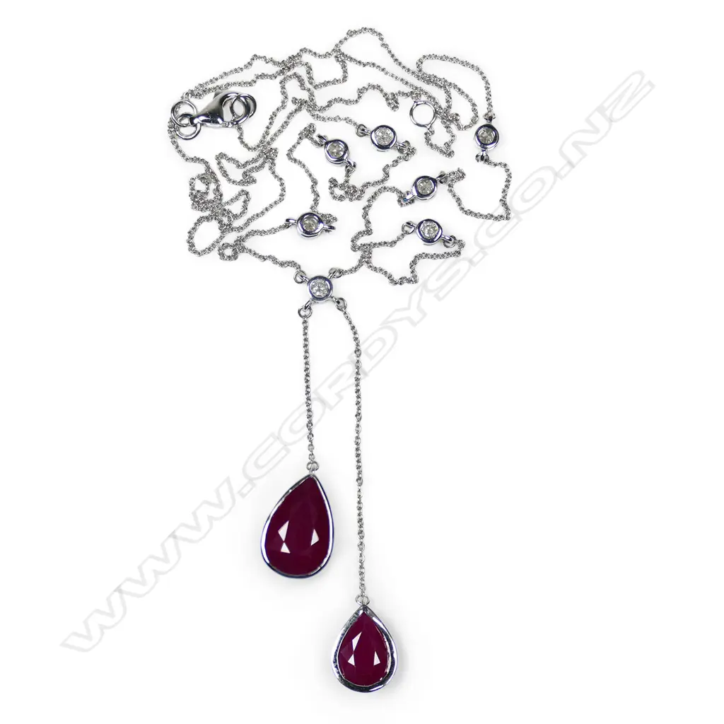 A 14ct white gold ruby and diamond necklace, Image 1++