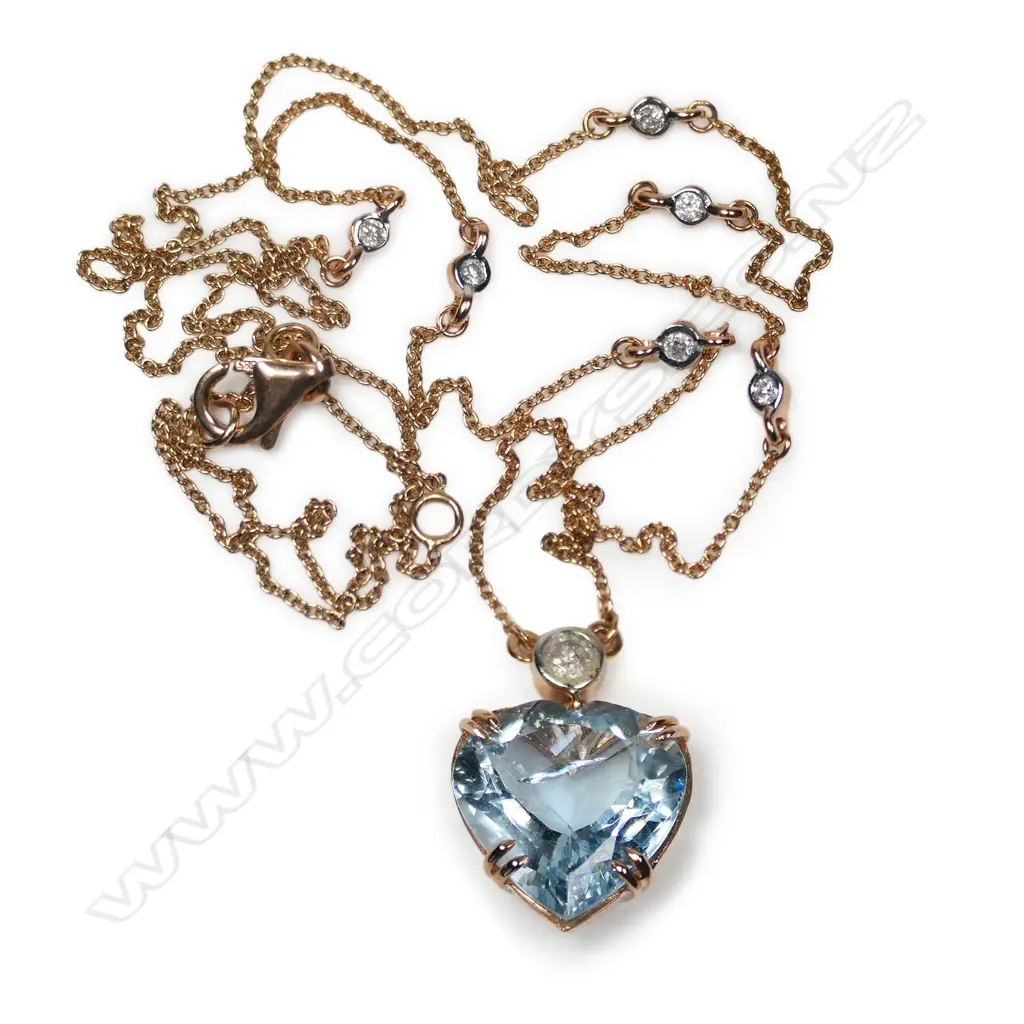 A 14ct rose gold aquamarine and diamond pendant necklace, Image 1++
