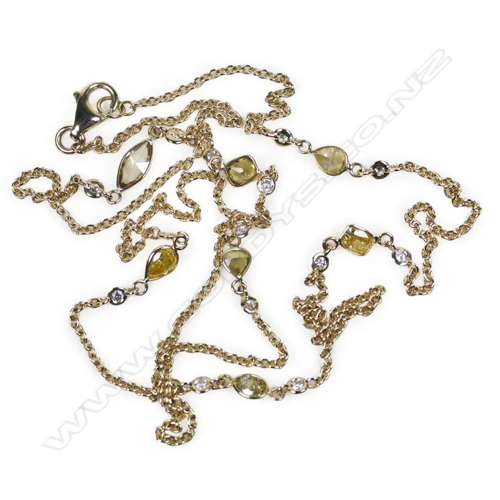 A 14ct gold mixed fancy yellow diamond chain necklace, Image 1++