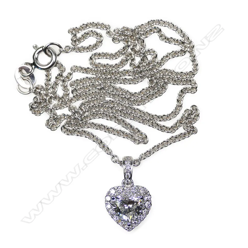 An 18ct white gold and diamond pendant necklace, Image 1++