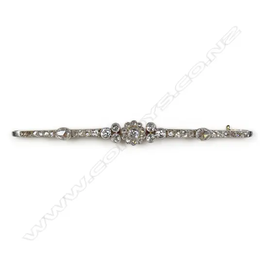 An antique gold and diamond bar brooch,