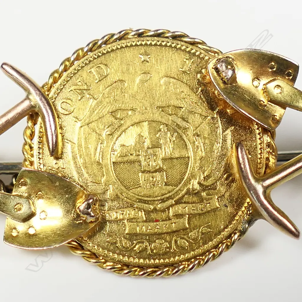 A late 19thC gold coin and mining themed brooch, Image 1++
