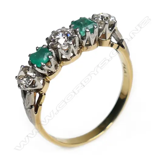 A vintage 18ct gold five stone emerald and diamond ring,