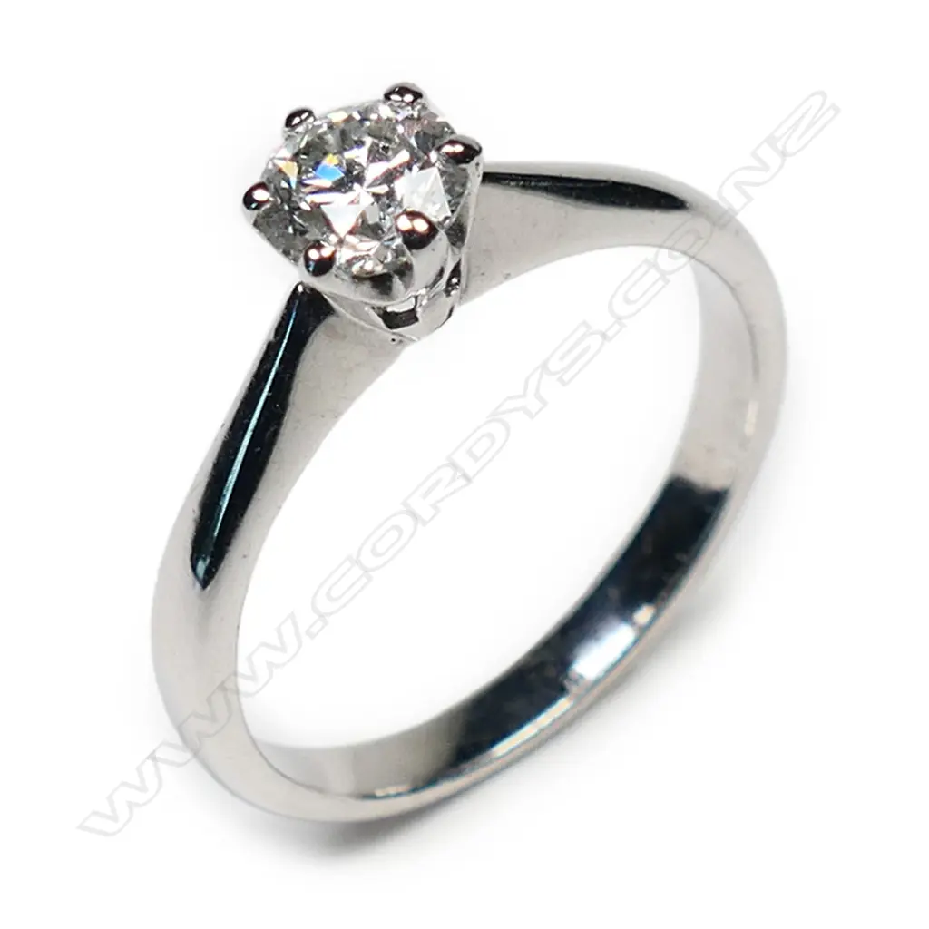 An 18ct white gold and diamond solitaire ring, Image 1++