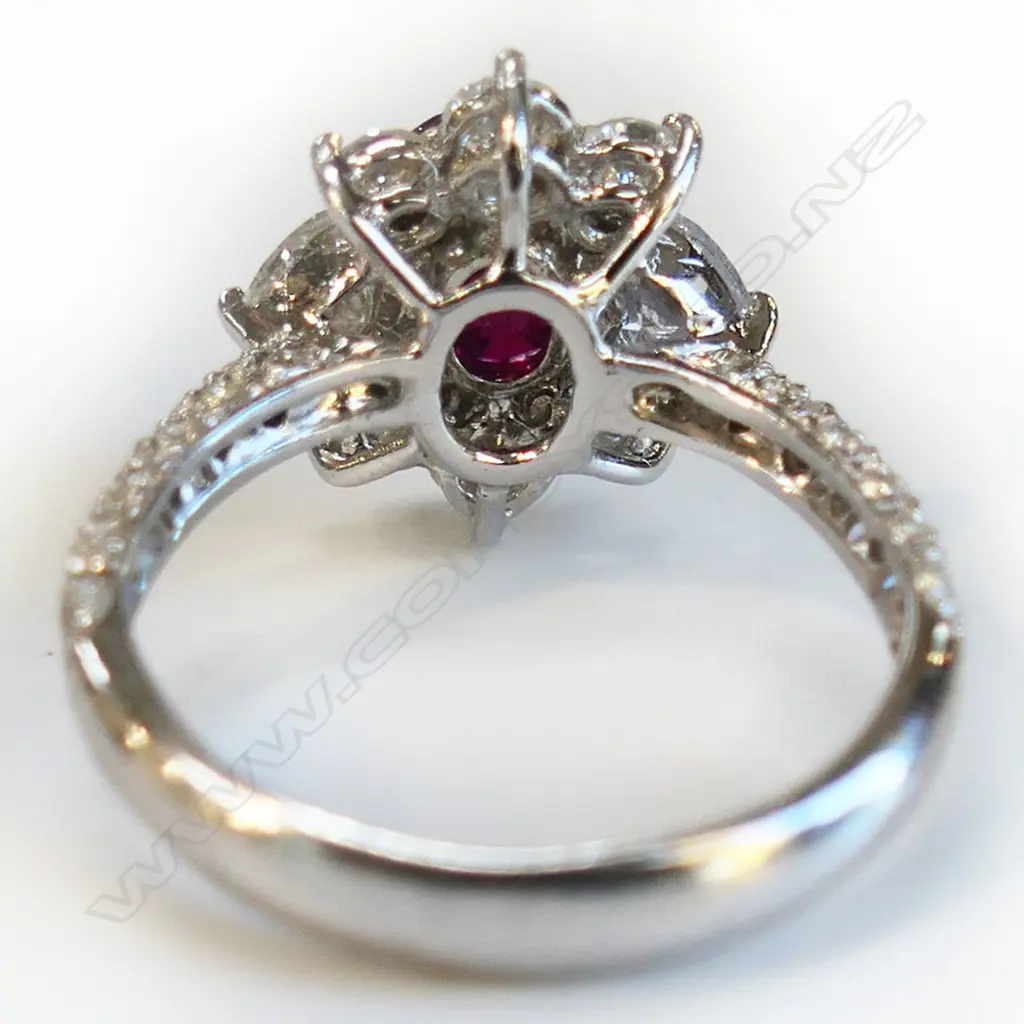 An 18ct white gold diamond and ruby ring, Image 1++