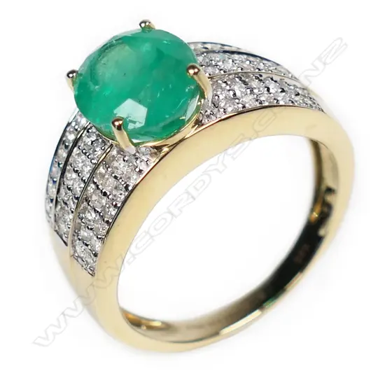 A 14ct gold Columbian emerald and diamond ring,