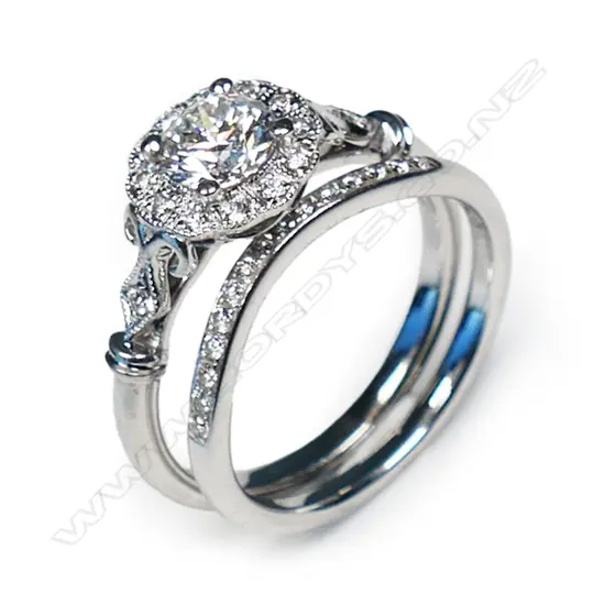 An 18ct white gold and diamond ring set,