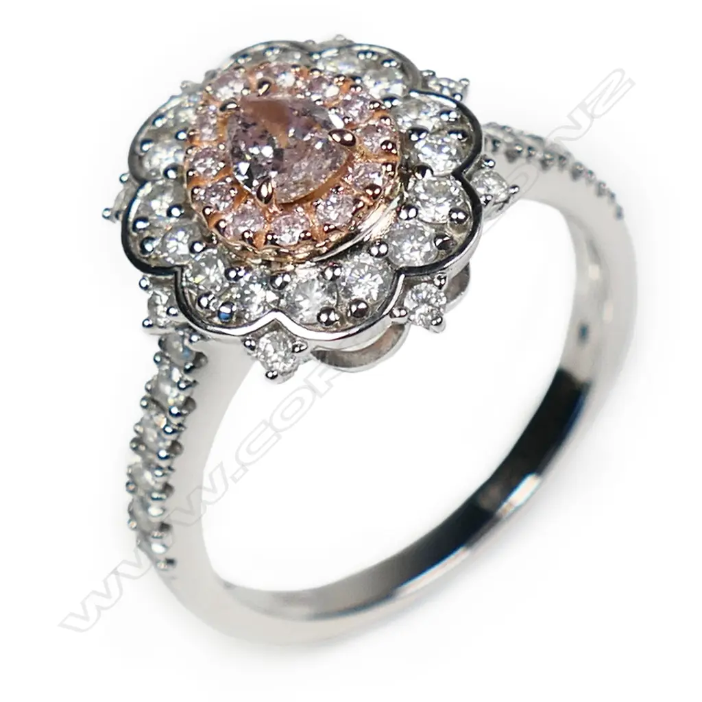 A 14ct white and rose gold pink diamond double halo ring, Image 1++