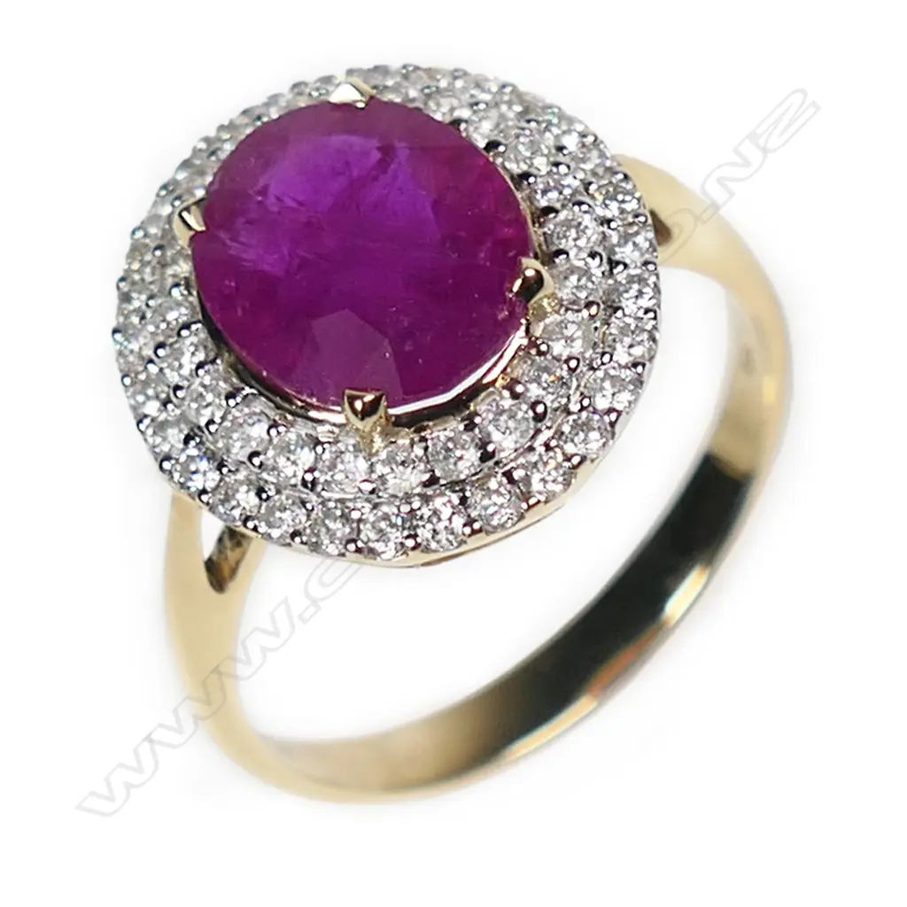 A 14ct gold ruby and diamond double halo ring, Image 1++