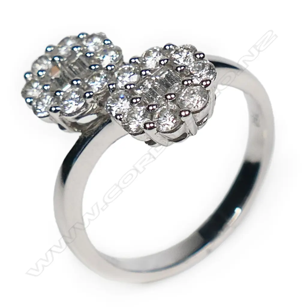 An 18ct white gold and double diamond cluster ring, Image 1++