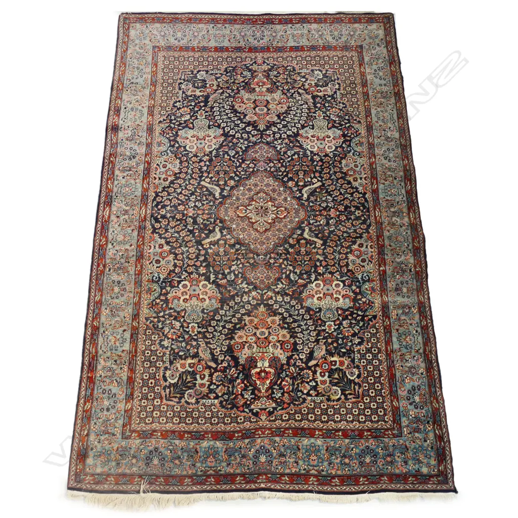A hand knotted Persian rug, Image 1++