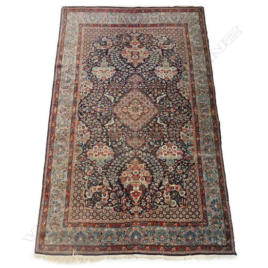 A hand knotted Persian rug,