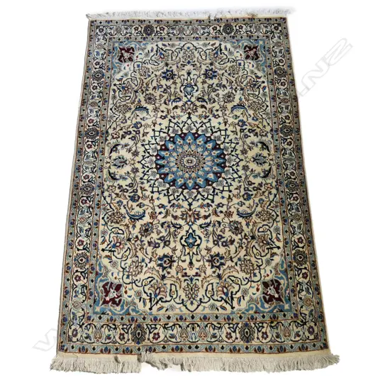 A hand-knotted Mashad rug; 1200 x 2000mm,