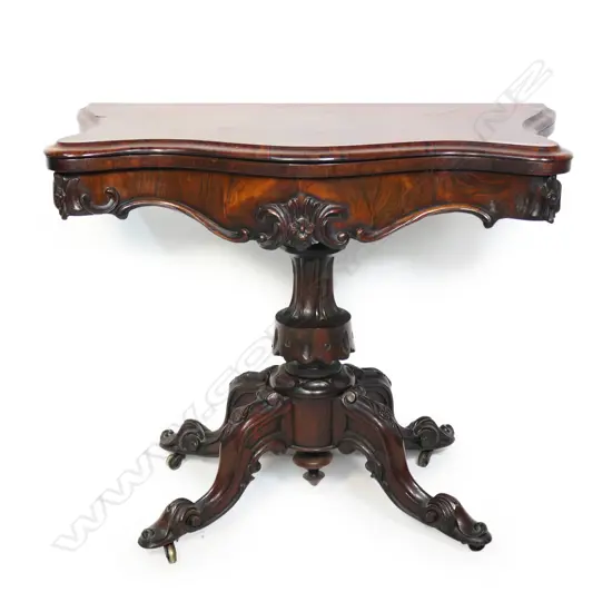 A Victorian rosewood card table,
