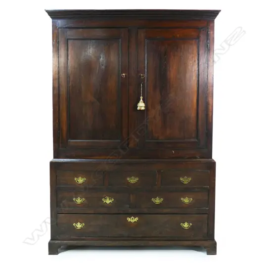 A George III oak section house keepers cupboard,