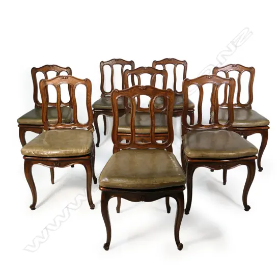 A set of eight oak dining chairs,