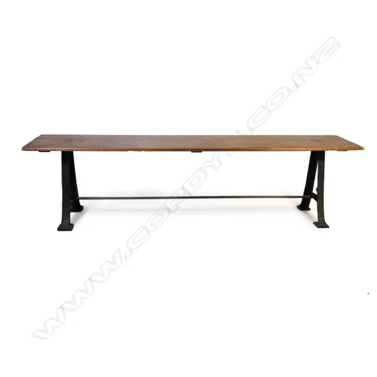An industrial style pine plank top table,