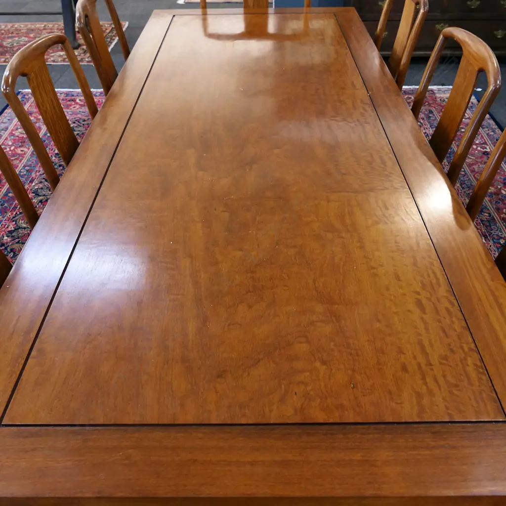 A vintage Chinese rosewood long dining table and eight chairs, Image 1++