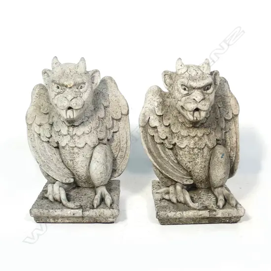A pair of cast concrete garden snake gargoyles,