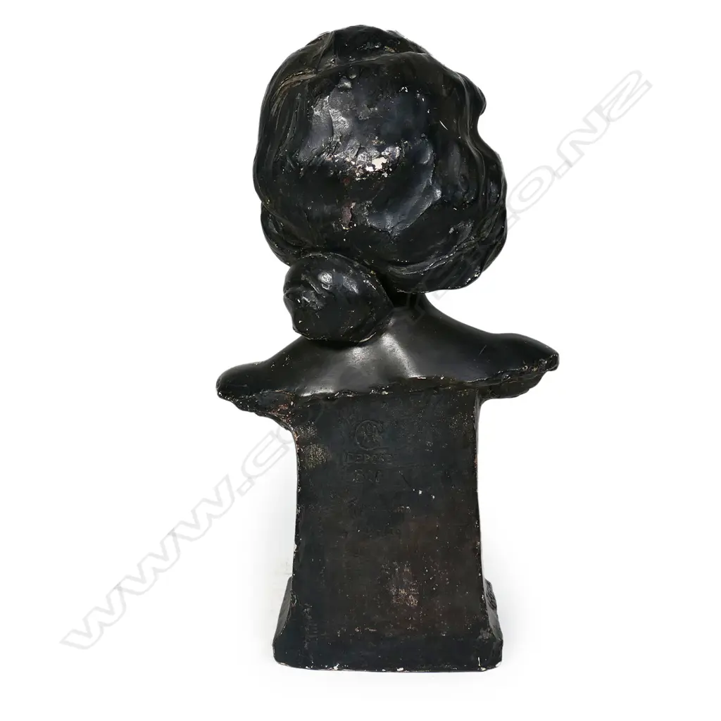 A French Art Nouveau pottery bust of a young woman, Image 1++