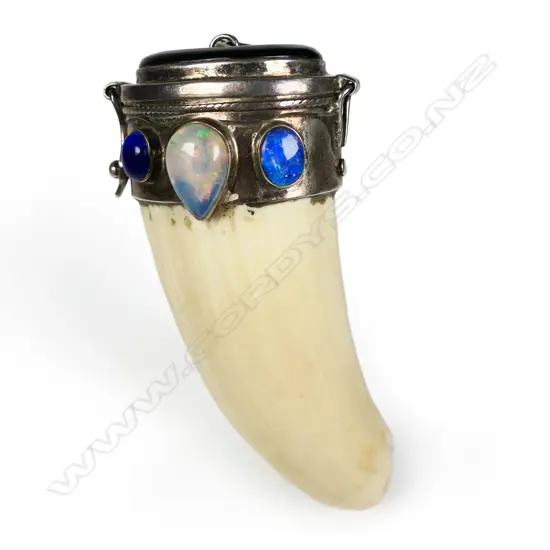 An old whales tooth pendant/mull,