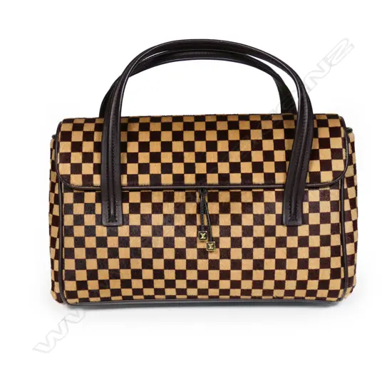 A Louis Vuitton Damier Sauvage limited edition Lionne Spawn bag,