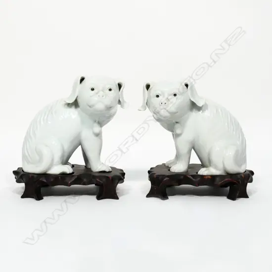A pair of Japanese porcelain Hirado puppies,