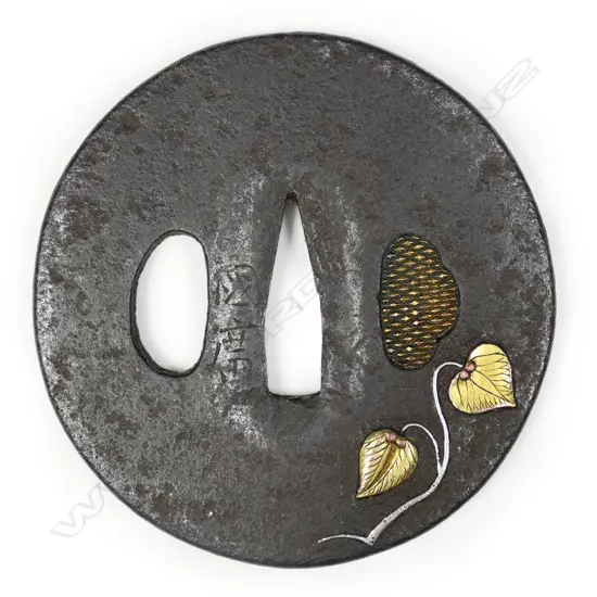 A 17thC Edo period iron tsuba,