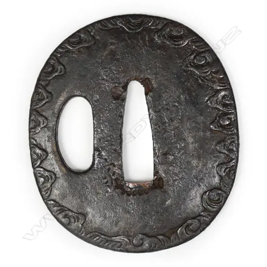 A 16thC late Muromachi period iron tsuba,